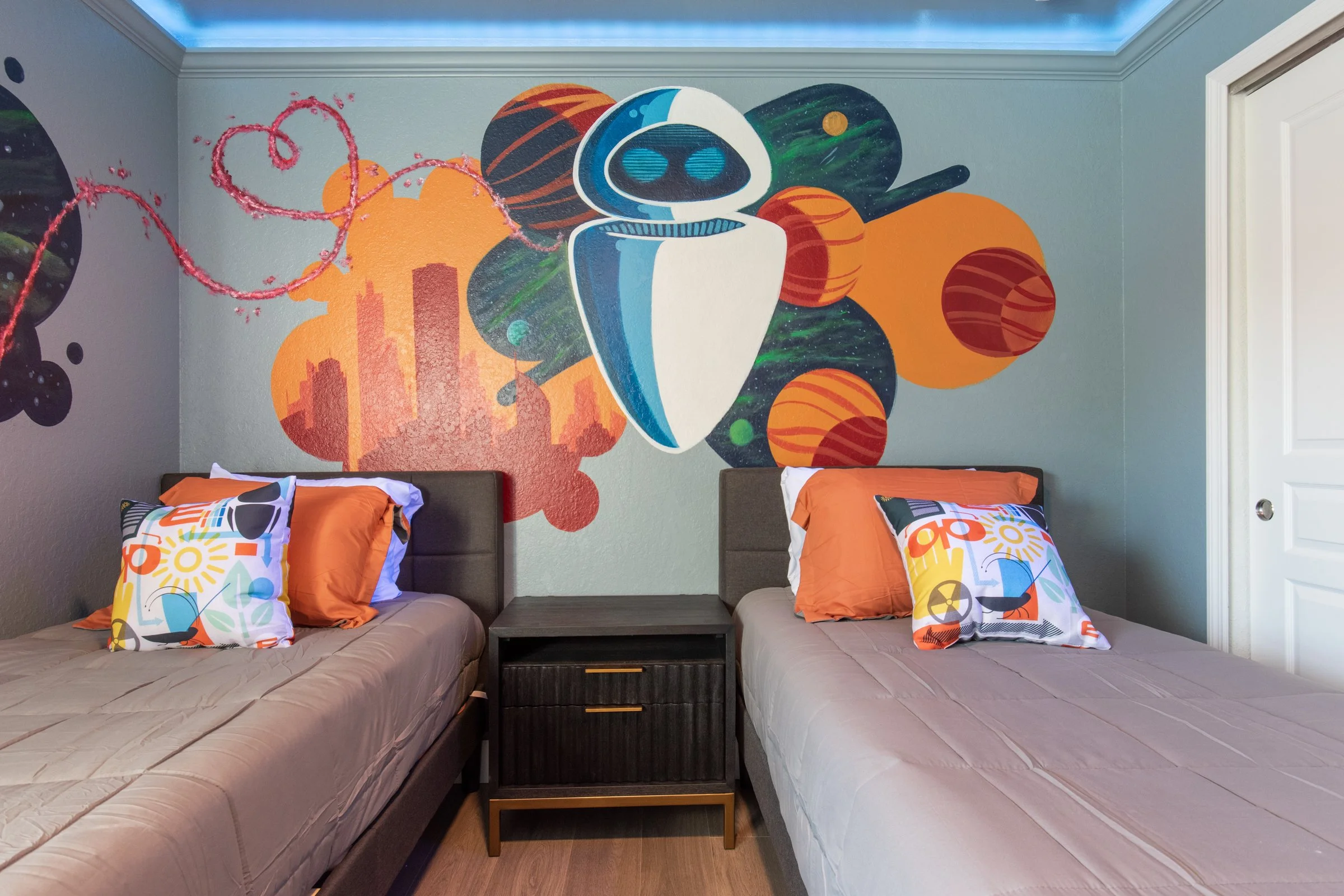 WALL·E themed twin bedroom with hand-painted character details at Time-Out Corner — Windsor Hills vacation rental