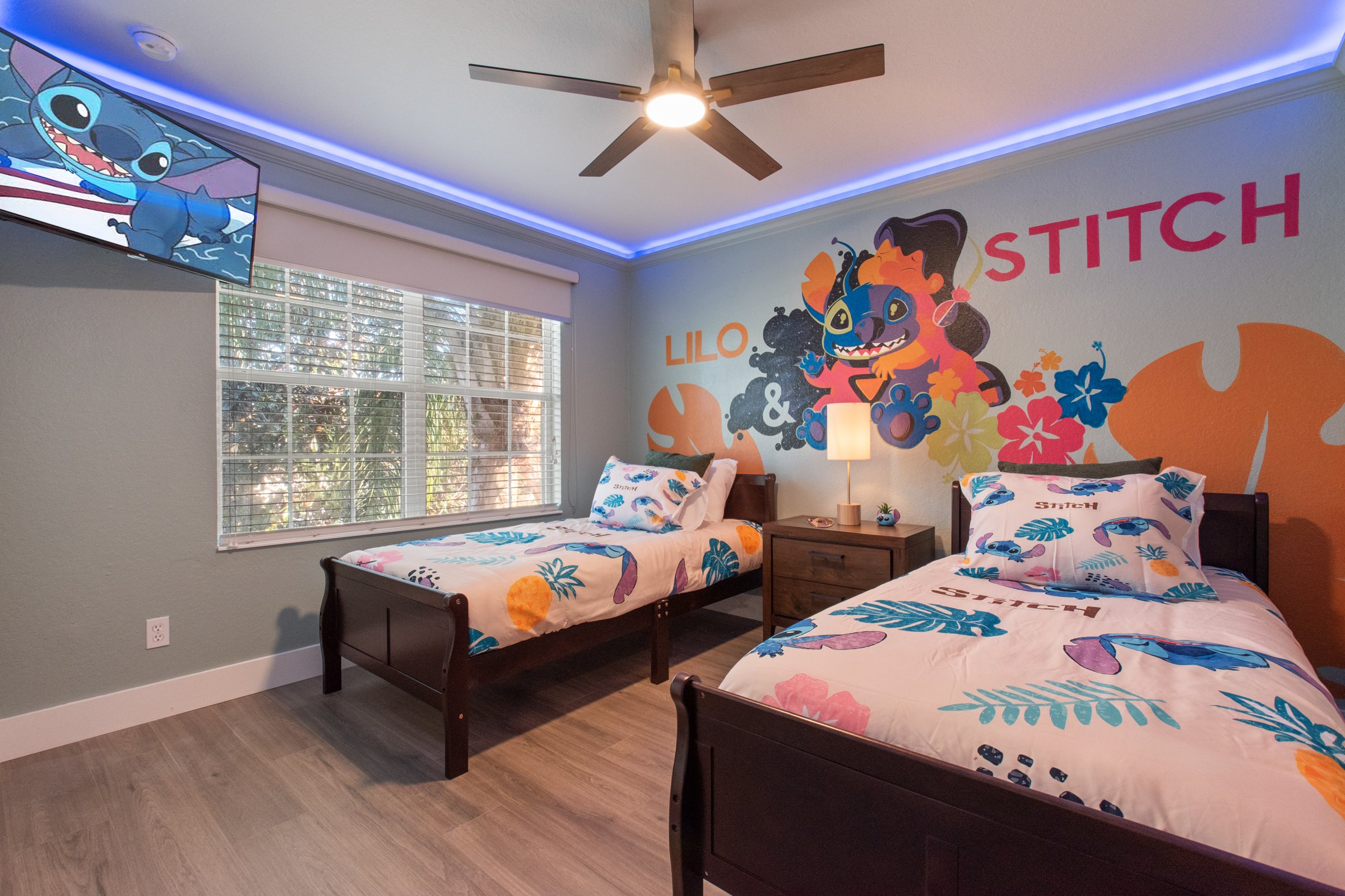 Lilo & Stitch themed twin bedroom with Hawaiian-inspired decor