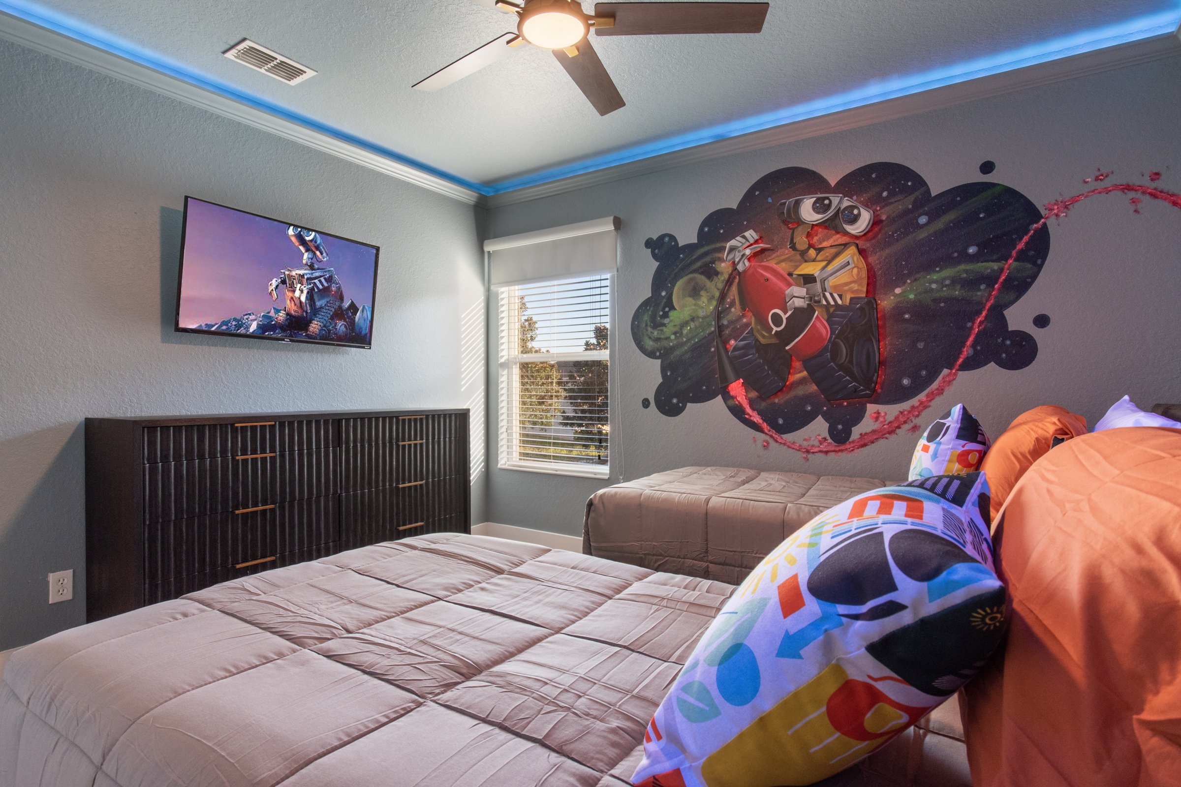 WALL·E themed twin bedroom with hand-painted character details