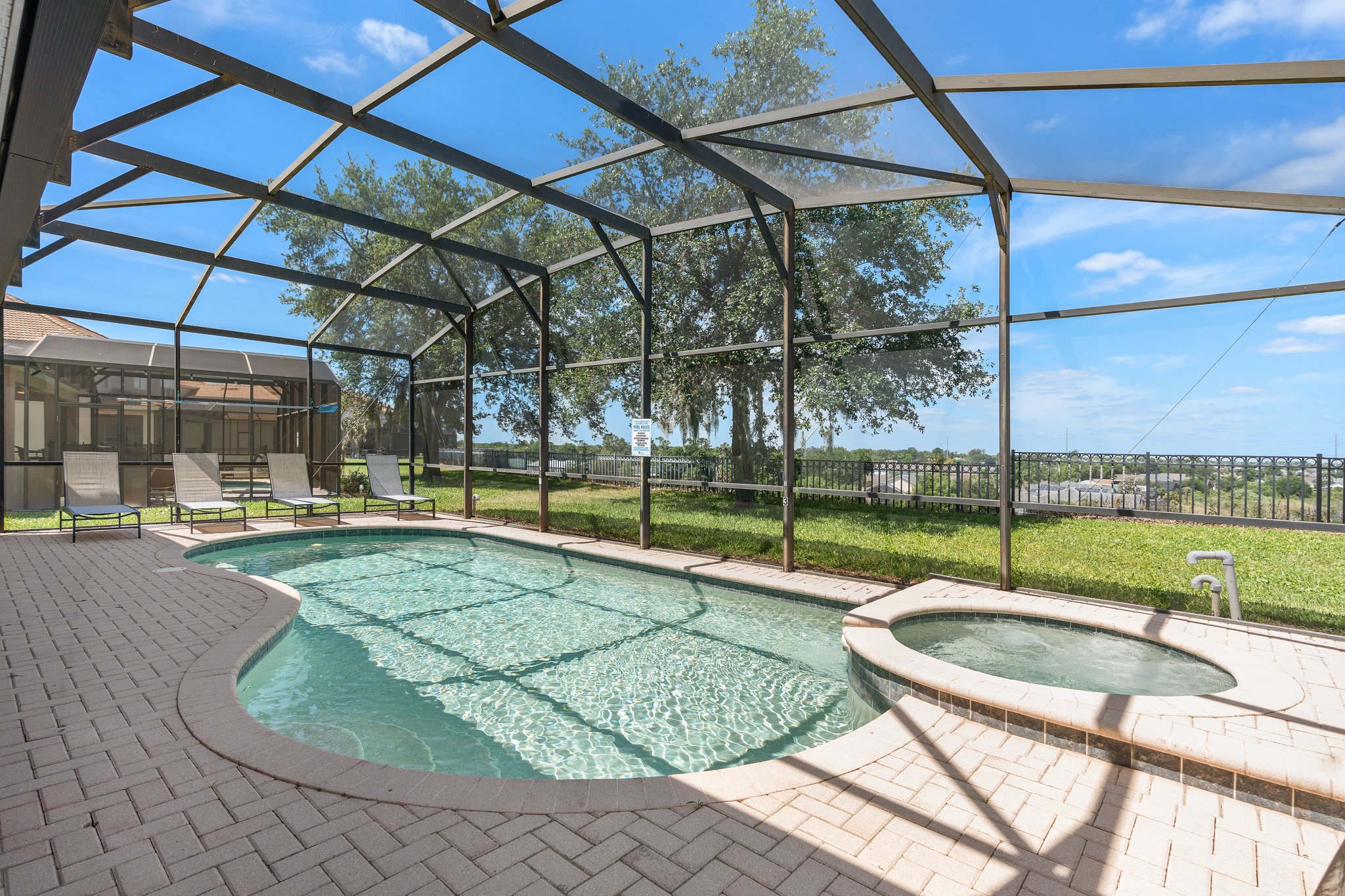 Screened lanai with heated saltwater pool