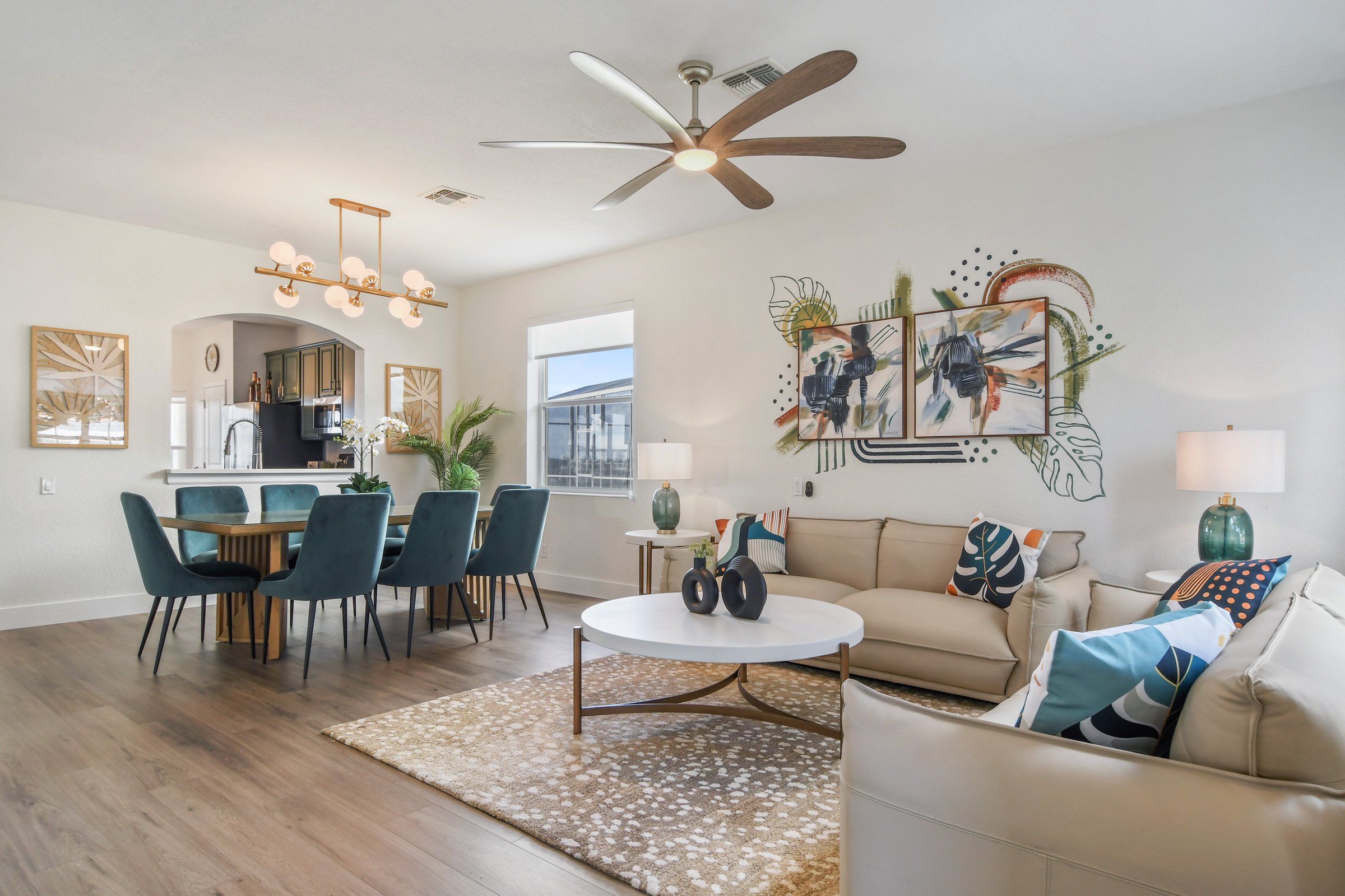 Open-concept living and dining area with hilltop sunset views