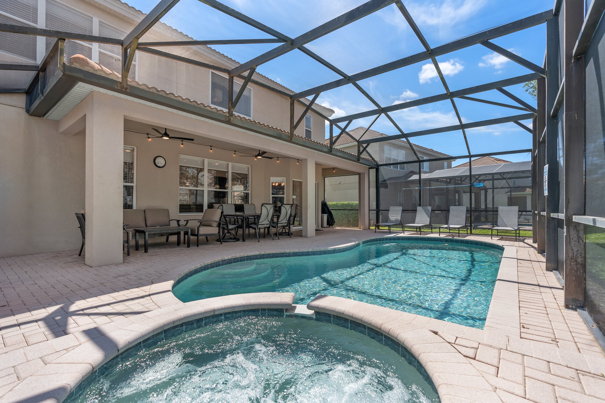 Pool deck with hilltop sunset views
