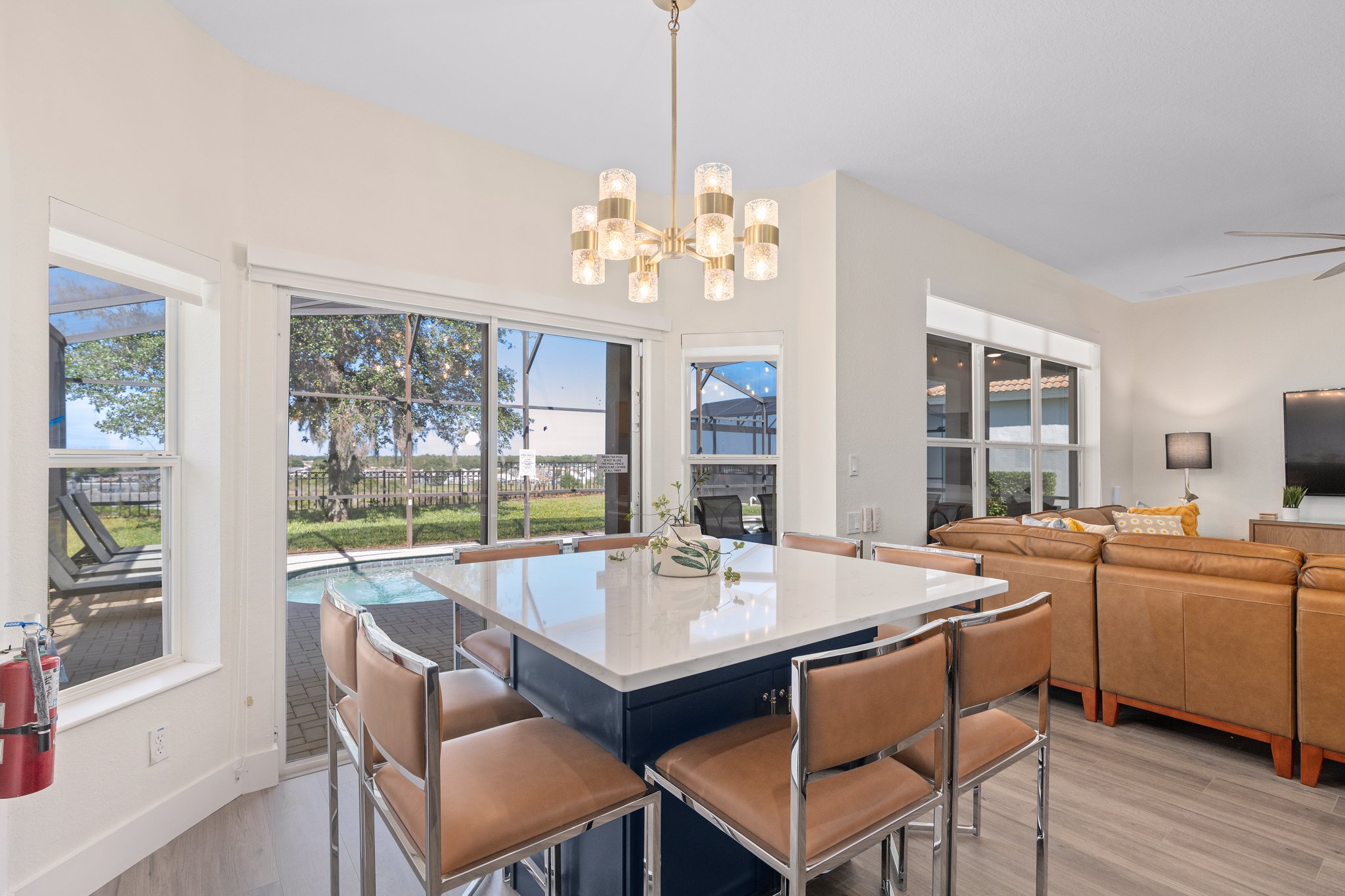 Kitchen island with bar seating and full appliances