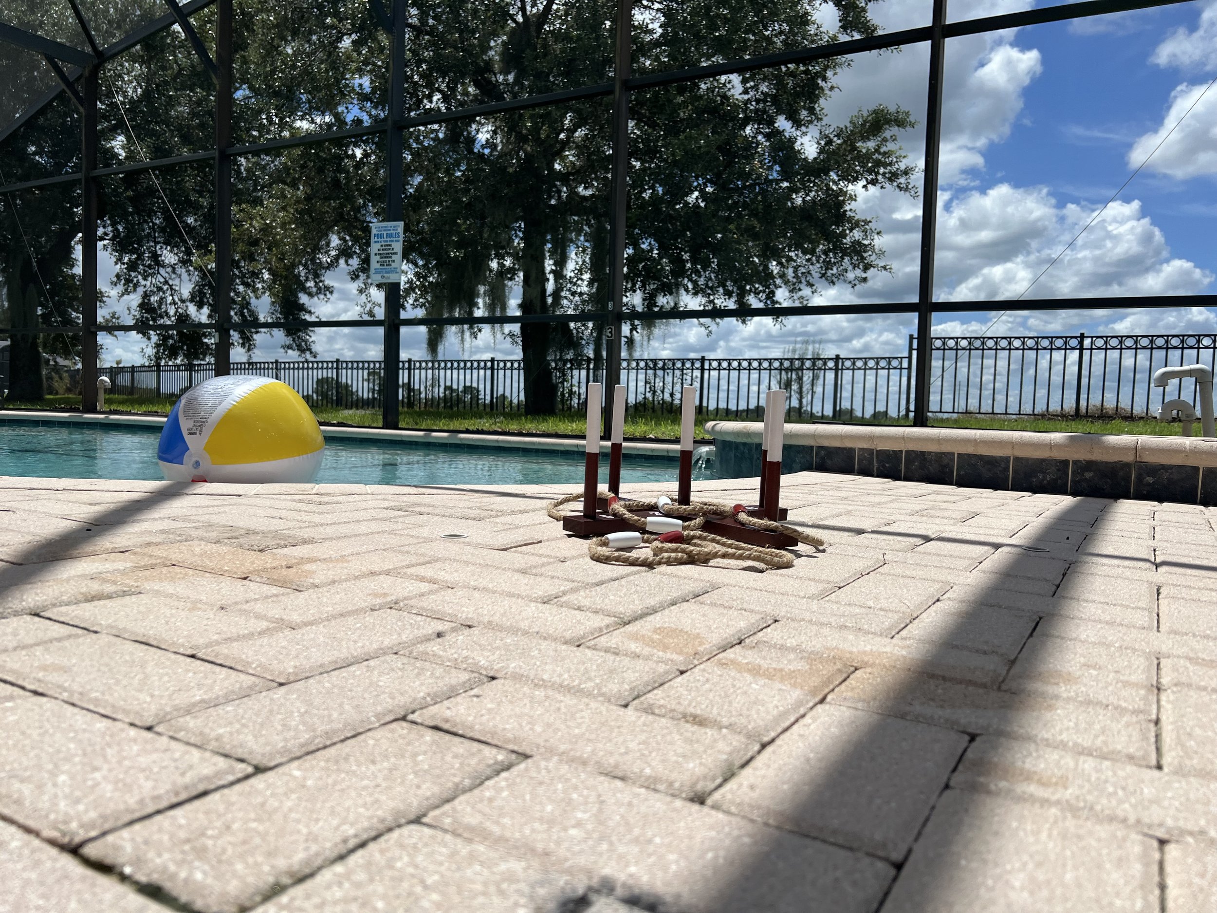 Guests relaxing poolside on the hilltop