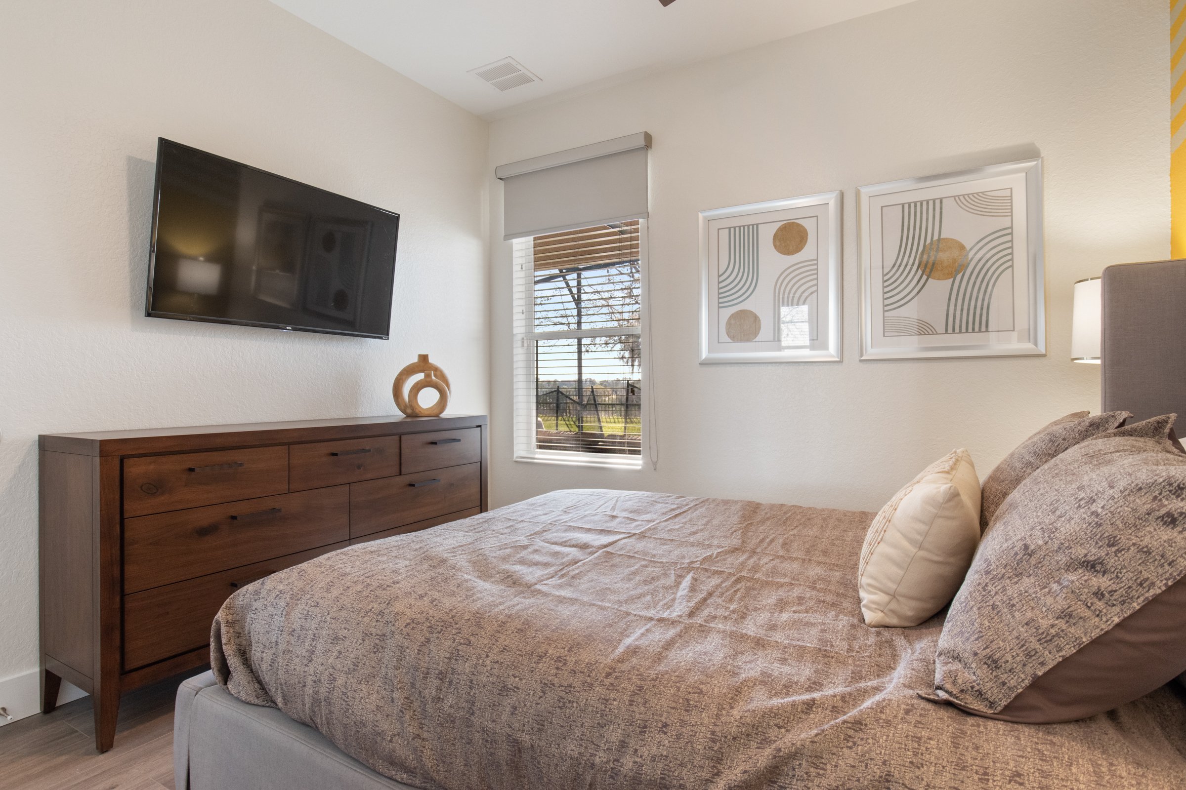 Queen bedroom with garden view and blackout shades
