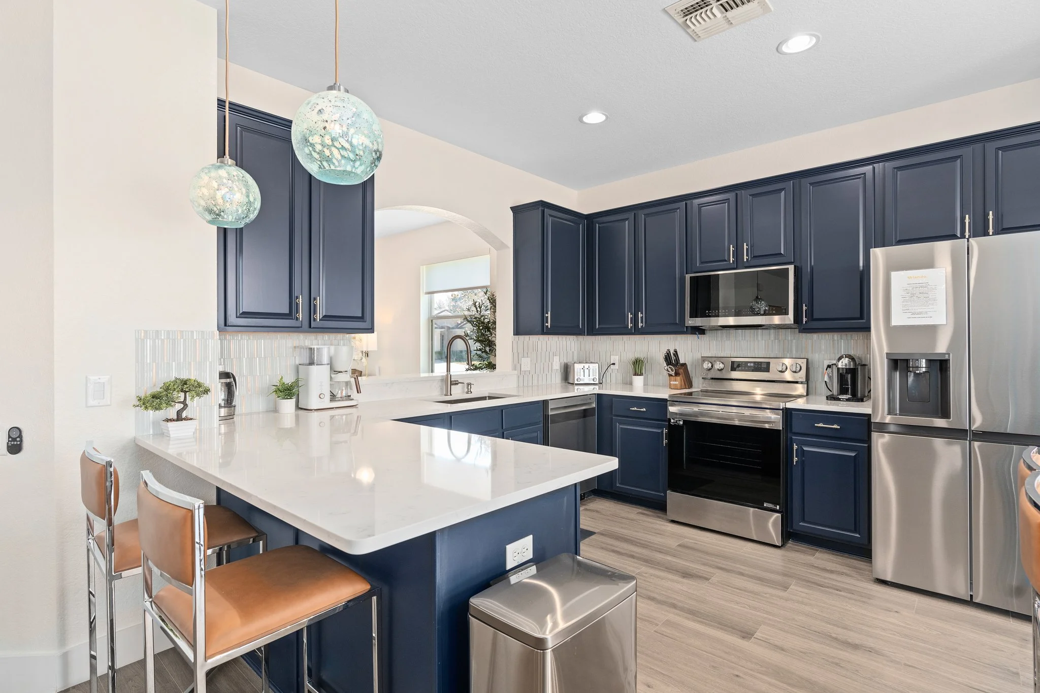 Kitchen with full appliances and Disney-themed bakeware