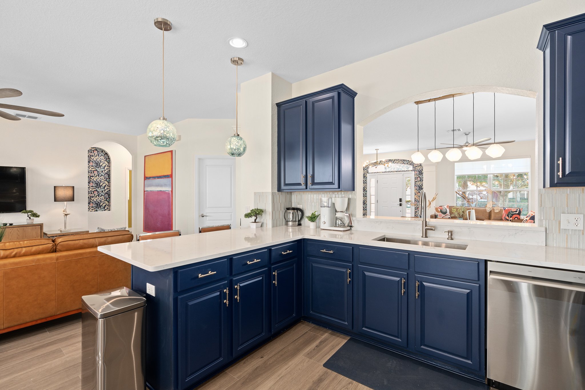 Kitchen flowing into dining and family areas