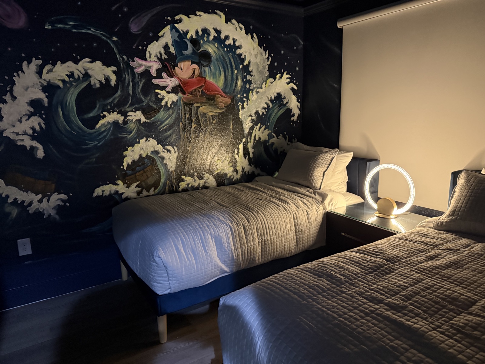Fantasia (Sorcerer Mickey) twin room with hand-painted wave mural at Time-Out Corner, Lakeside