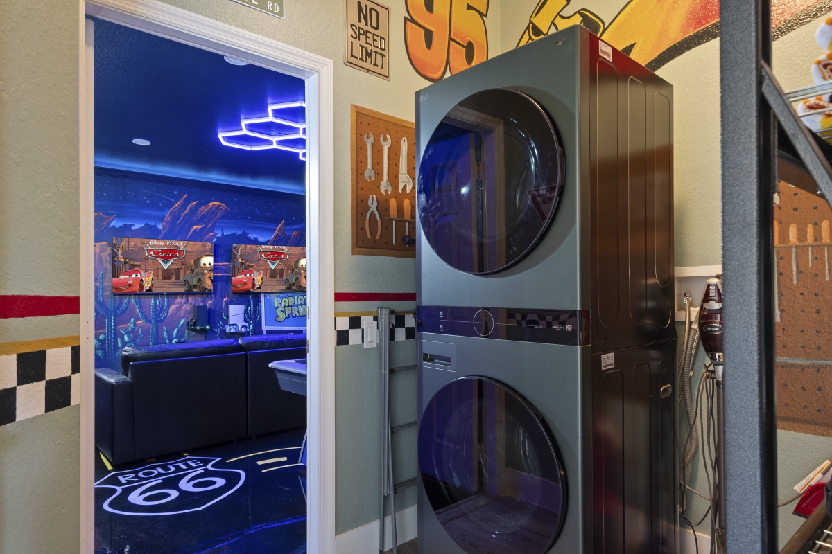 Route 66 themed laundry nook next to the Radiator Springs game room