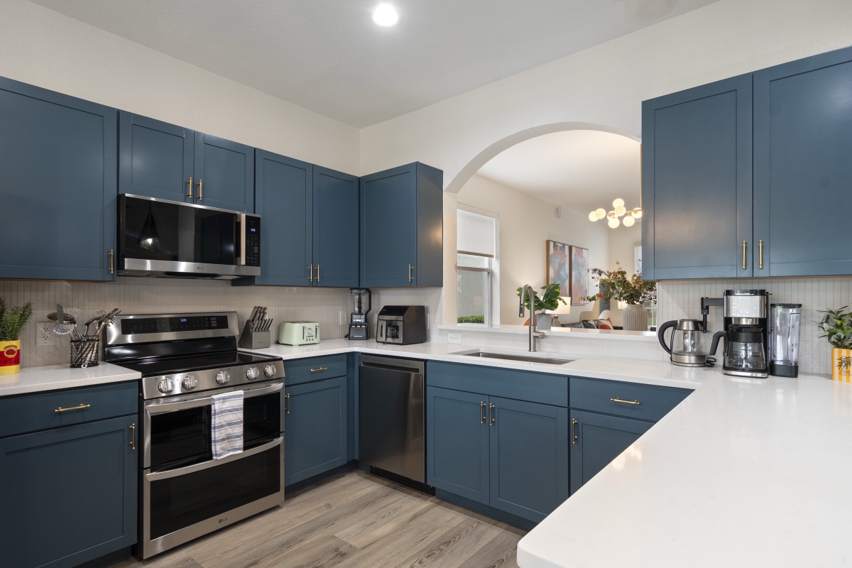 Kitchen with navy cabinets and large island at Time-Out Corner, Lakeside