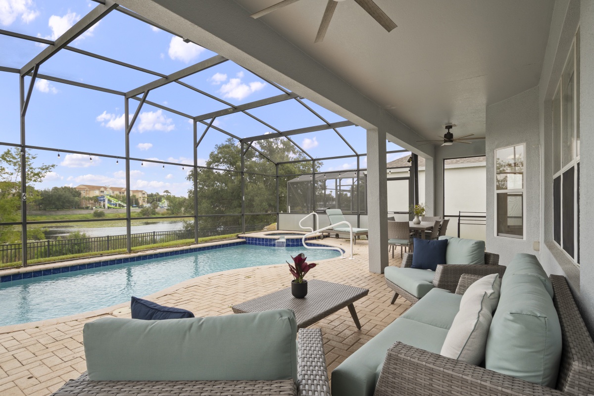 Covered lanai seating next to the pool at Time-Out Corner, Lakeside