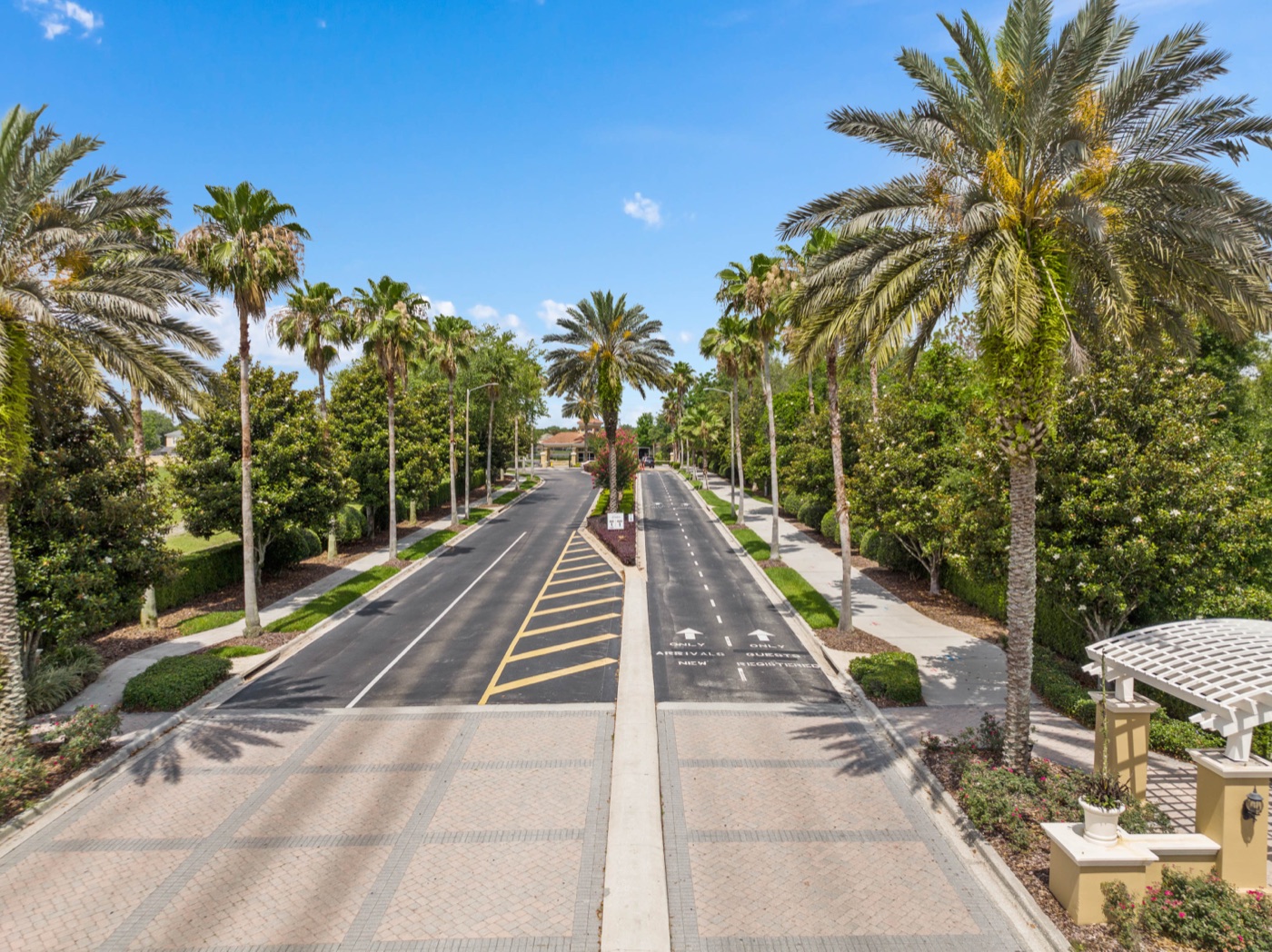 Palm-lined entrance boulevard leading into Windsor Hills Resort